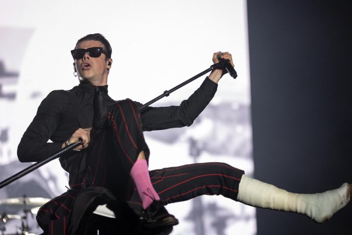 Yungblud Crowd-Surfs in a Wheelchair While Performing With Broken Leg